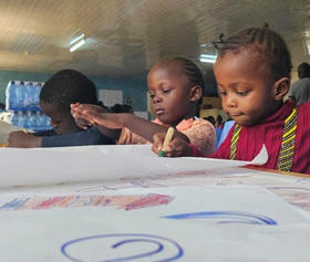 Emergency Pedagogy Kenya Three kids painting