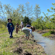Kids are playing at the river
